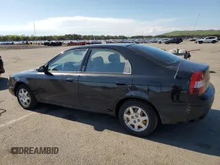 2001 Kia Spectra GS z VIN KNAFB161115036033, wystawiony jako Copart lot #55939335 z przebiegiem 76 414 mil mil oraz Szkoda całkowita • Salvage title. Historia ofert i sprzedaży dostępna na DreamBid. Obrazek 2.