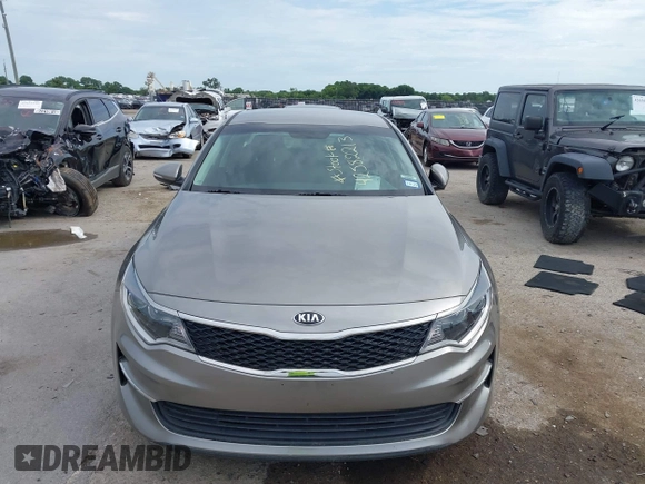2016 Kia Optima LX with VIN 5XXGT4L37GG019897, listed as a IAAI auction lot 42582213 with 90,318 mi miles and . Bid and sale history available at DreamBid. Image 12.