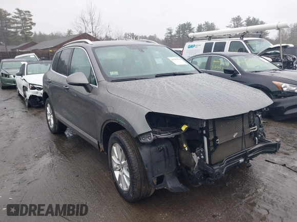 2013 Volkswagen Touareg Lux with VIN WVGEF9BP7DD007170, listed as a IAAI auction lot 41787075 with 131,089 mi miles and . Bid and sale history available at DreamBid. Image 14.