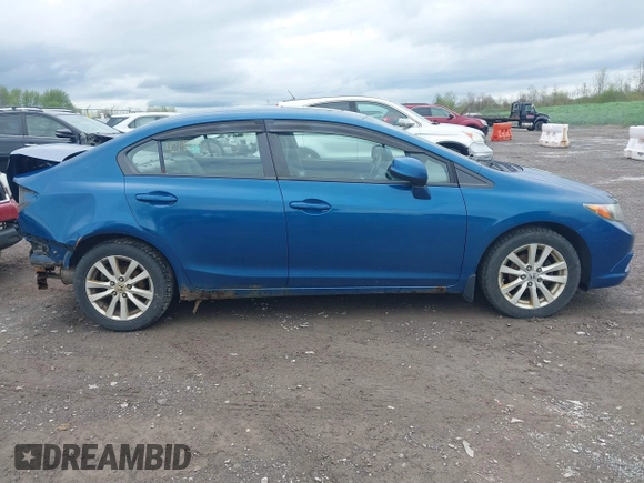 2012 Honda Civic EX with VIN 2HGFB2F86CH544873, listed as a IAAI auction lot 42192313 with 285,400 mi miles and . Bid and sale history available at DreamBid. Image 14.