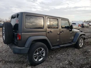 2018 Jeep Wrangler JK Unlimited Sport S with VIN 1C4BJWDG9JL882737, listed as a Copart auction lot 85765184 with 60,578 mi miles and Salvage Title. Bid and sale history available at carsss.com. Image 3.