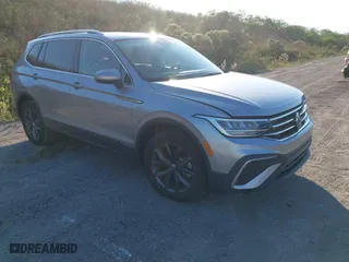 2023 Volkswagen Tiguan SE with VIN 3VVNB7AXXPM079707, listed as a IAAI auction lot 40931275 with 29,021 mi miles. Bid and sale history available at carsss.com. Image 1.