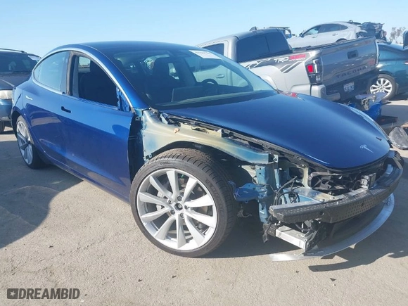 2019 Tesla Model 3 Long Range with VIN 5YJ3E1EB3KF497841, listed as a IAAI auction lot 41969728 with 21,127 mi miles. Bid and sale history available at carsss.com. Image 1.