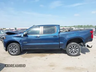 2021 Chevrolet Silverado 1500 LT z VIN 3GCUYDEDXMG111217, wystawiony jako IAAI lot #42056447 z przebiegiem 80 615 mil mil oraz . Historia ofert i sprzedaży dostępna na DreamBid. Obrazek 14.