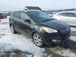 2015 Ford Escape Titanium with VIN 1FMCU0J90FUA32720, listed as a IAAI auction lot 41594336 with 180,250 mi miles. Bid and sale history available at carsss.com. Image 1.