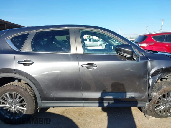 2017 Mazda CX-5 Touring with VIN JM3KFBCL2H0165625, listed as a IAAI auction lot 41879145 with 64,745 mi miles. Bid and sale history available at carsss.com. Image 13.