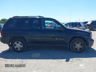2002 Chevrolet TrailBlazer LTZ with VIN 1GNDT13S222183007, listed as a IAAI auction lot 41786630 with 216,878 mi miles and . Bid and sale history available at DreamBid. Image 13.