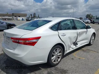 2014 Toyota Avalon Limited z VIN 4T1BK1EB1EU117097, wystawiony jako IAAI lot #41937996 z przebiegiem 169 336 mil mil oraz . Historia ofert i sprzedaży dostępna na DreamBid. Obrazek 4.