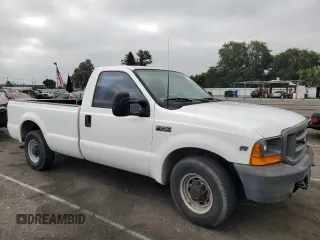 2000 Ford Super Duty F-250 XL with VIN 1FTNF20SXYEE41859, listed as a Copart auction lot 59682704 with 190,234 mi miles and Salvage Title. Bid and sale history available at carsss.com. Image 4.