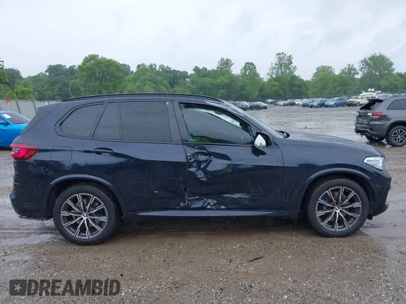 2022 BMW X5 xDrive40i with VIN 5UXCR6C0XN9K22953, listed as a IAAI auction lot 42371776 with 36,912 mi miles and . Bid and sale history available at DreamBid. Image 13.