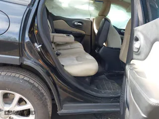 2016 Jeep Cherokee Sport with VIN 1C4PJLAS9GW208334, listed as a IAAI auction lot 41449928 with 163,826 mi miles. Bid and sale history available at carsss.com. Image 8.