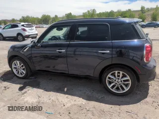 2012 MINI Countryman S with VIN WMWZC3C57CWL87894, listed as a Copart auction lot 56683985 with 54,032 mi miles and Salvage title. Bid and sale history available at DreamBid. Image 2.