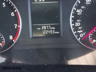 2014 Volkswagen Passat Wolfsburg Ed with VIN 1VWAT7A38EC051892, listed as a IAAI auction lot 41523058 with 122,493 mi miles. Bid and sale history available at carsss.com. Image 7.