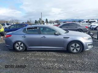 2012 Kia Optima Hybrid with VIN KNAGM4AD5C5022673, listed as a IAAI auction lot 41506860 with 121,982 mi miles. Bid and sale history available at carsss.com. Image 14.
