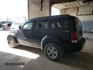2009 Dodge Nitro SE z VIN 1D8GU28K89W545430, wystawiony jako Copart lot #50225085 z przebiegiem 143 938 mil mil oraz Szkoda całkowita • Salvage title. Historia ofert i sprzedaży dostępna na DreamBid. Obrazek 2.
