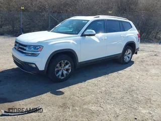2018 Volkswagen Atlas SE with VIN 1V2LR2CA3JC577302, listed as a IAAI auction lot 41733691 with 66,185 mi miles and . Bid and sale history available at DreamBid. Image 2.