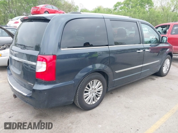 2014 Chrysler Town & Country Limited with VIN 2C4RC1GG3ER188114, listed as a IAAI auction lot 42082618 with 193,562 mi miles and . Bid and sale history available at DreamBid. Image 4.