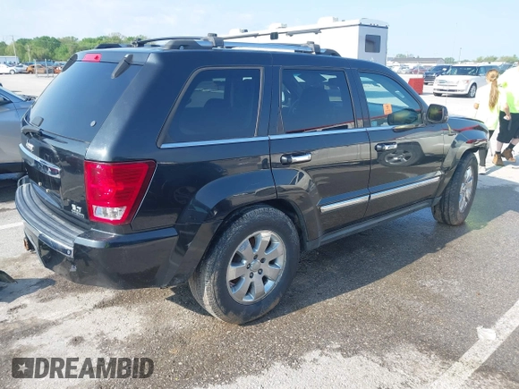 2010 Jeep Grand Cherokee Limited with VIN 1J4RR5GT6AC147699, listed as a IAAI auction lot 42118353 with 212,961 mi miles and . Bid and sale history available at DreamBid. Image 4.