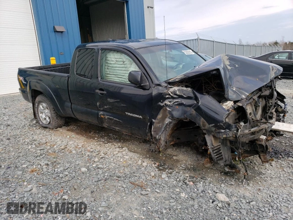 2009 Toyota Tacoma with VIN 5TEUU42N39Z660570, listed as a Copart auction lot 52025513 with 106,815 mi miles and Salvage title. Bid and sale history available at DreamBid. Image 4.
