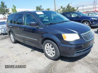 2014 Chrysler Town & Country Touring with VIN 2C4RC1BGXER221486, listed as a IAAI auction lot 41990508 with 142,749 mi miles. Bid and sale history available at carsss.com. Image 1.
