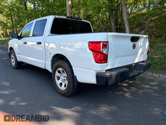 2017 Nissan Titan SV with VIN 1N6AA1EK5HN530011, listed as a Copart auction lot 57471455 with 216,992 mi miles and Clean title. Bid and sale history available at DreamBid. Image 3.