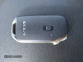 2023 Kia Forte GT-Line z VIN 3KPF54AD2PE685043, wystawiony jako IAAI lot #42041237 z przebiegiem 25 750 mil mil oraz . Historia ofert i sprzedaży dostępna na DreamBid. Obrazek 11.