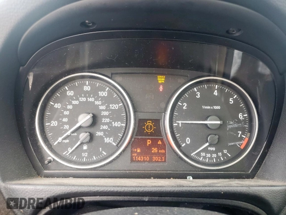 2010 BMW 3 Series 328i xDrive with VIN WBAPK5C57AA652894, listed as a Copart auction lot 62106955 with 114,310 mi miles and Salvage title. Bid and sale history available at DreamBid. Image 9.