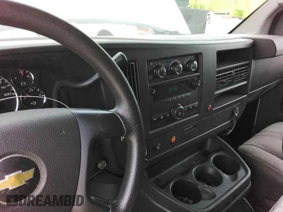 2013 Chevrolet Express Cargo with VIN 1GCSGAFX3D1133091, listed as a IAAI auction lot 42239876 with 71,008 mi miles and . Bid and sale history available at DreamBid. Image 22.