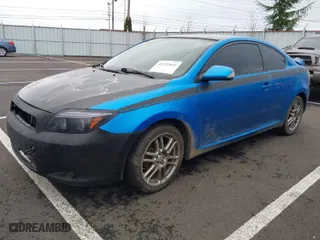 2010 Scion tC with VIN JTKDE3B79A0315842, listed as a IAAI auction lot 41222055 with 146,328 mi miles. Bid and sale history available at carsss.com. Image 2.