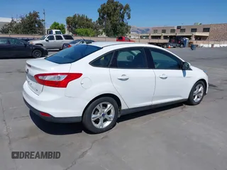 2013 Ford Focus SE with VIN 1FADP3F26DL340707, listed as a IAAI auction lot 42588722 with 71,907 mi miles and . Bid and sale history available at DreamBid. Image 4.