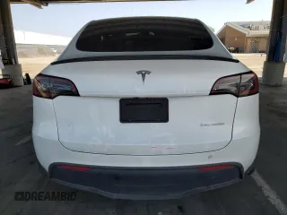 2023 Tesla Model Y Long Range with VIN 7SAYGDEE8PF620703, listed as a Copart auction lot 54655105 with 29,538 mi miles and Salvage Title. Bid and sale history available at DreamBid. Image 6.