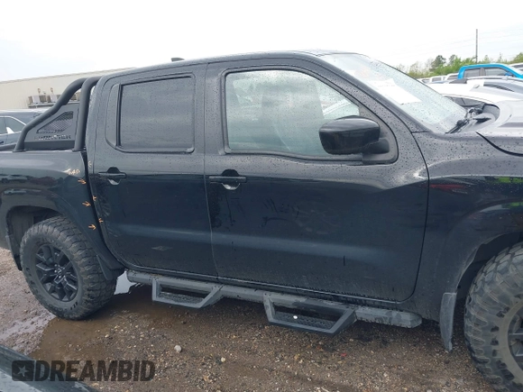2023 Nissan Frontier SV with VIN 1N6ED1EJ2PN626418, listed as a IAAI auction lot 41883955 with 30,918 mi miles and . Bid and sale history available at DreamBid. Image 14.