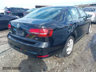 2017 Volkswagen Jetta 1.4T S with VIN 3VW167AJ4HM333245, listed as a IAAI auction lot 41582993 with 121,874 mi miles. Bid and sale history available at carsss.com. Image 4.