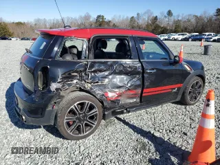 2014 MINI Countryman John Cooper Works with VIN WMWXD1C5XEWS34681, listed as a Copart auction lot 41781005 with 133,463 mi miles and Salvage Title. Bid and sale history available at DreamBid. Image 3.