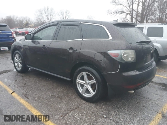 2010 Mazda CX-7 Grand Touring z VIN JM3ER4W32A0338657, wystawiony jako IAAI lot #41207462 z przebiegiem 257 713 mil mil oraz . Historia ofert i sprzedaży dostępna na DreamBid. Obrazek 3.