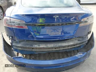 2021 Tesla Model S Long Range with VIN 5YJSA1E51MF442874, listed as a IAAI auction lot 39406495 with 36,127 mi miles and . Bid and sale history available at DreamBid. Image 6.