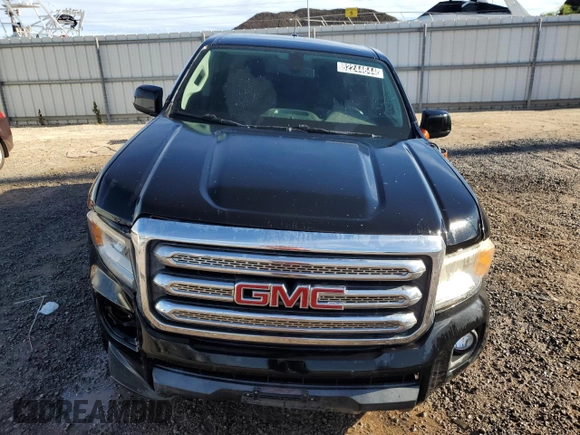 2016 GMC Canyon 2WD SLE with VIN 1GTG5CE35G1256661, listed as a Copart auction lot 82244644 with 104,496 mi miles and Clean Title. Bid and sale history available at carsss.com. Image 5.