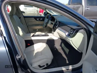 2024 Volvo S60 Core Dark Theme with VIN 7JRL12TKXRG295195, listed as a IAAI auction lot 42616001 with 37,540 mi miles and . Bid and sale history available at DreamBid. Image 5.