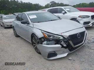 2020 Nissan Altima SR z VIN 1N4BL4CV5LN301259, wystawiony jako IAAI lot #42150709 z przebiegiem 52 512 mil mil oraz . Historia ofert i sprzedaży dostępna na DreamBid. Obrazek 1.