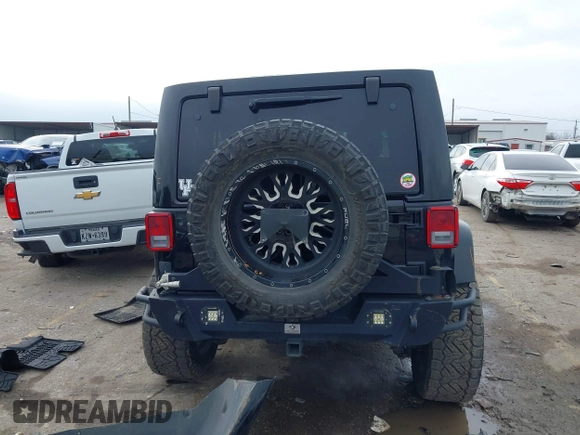 2017 Jeep Wrangler Unlimited Rubicon Recon z VIN 1C4HJWFG9HL592824, wystawiony jako IAAI lot #41427433 z przebiegiem 70 105 mil mil oraz . Historia ofert i sprzedaży dostępna na DreamBid. Obrazek 17.