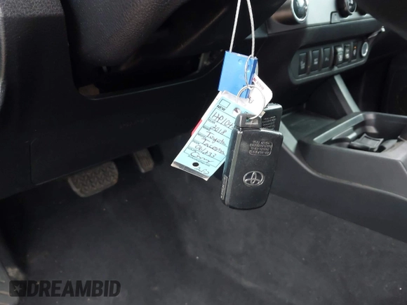 2018 Toyota Tacoma SR5 with VIN 3TMAZ5CN0JM061233, listed as a IAAI auction lot 41944668 with 94,314 mi miles and . Bid and sale history available at DreamBid. Image 11.