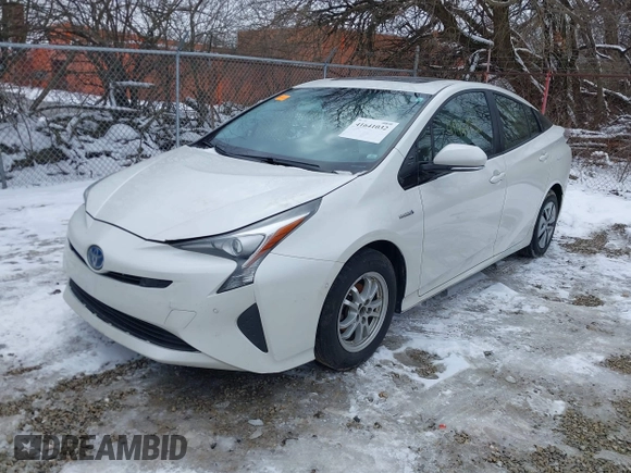 2018 Toyota Prius Two with VIN JTDKARFU9J3054742, listed as a IAAI auction lot 41641032 with 209,986 mi miles. Bid and sale history available at carsss.com. Image 2.