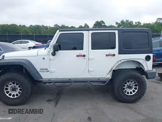 2018 Jeep Wrangler Unlimited Sport S with VIN 1C4BJWDG6JL818719, listed as a IAAI auction lot 42412991 with 58,399 mi miles and . Bid and sale history available at DreamBid. Image 14.