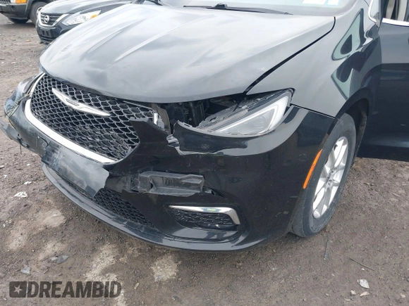 2022 Chrysler Pacifica Touring L with VIN 2C4RC1BG2NR117879, listed as a IAAI auction lot 41845778 with 96,523 mi miles and . Bid and sale history available at DreamBid. Image 6.