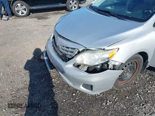 2013 Toyota Corolla L with VIN 5YFBU4EE7DP166021, listed as a IAAI auction lot 42027062 with 179,107 mi miles and . Bid and sale history available at DreamBid. Image 6.