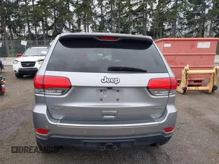 2014 Jeep Grand Cherokee Limited z VIN 1C4RJFBG8EC541921, wystawiony jako IAAI lot #41903574 z przebiegiem 133 679 mil mil oraz . Historia ofert i sprzedaży dostępna na DreamBid. Obrazek 17.