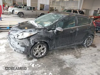 2011 Ford Fiesta SES with VIN 3FADP4FJ7BM196559, listed as a IAAI auction lot 41527976 with 65,861 mi miles. Bid and sale history available at carsss.com. Image 2.