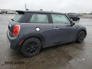 2014 MINI Hardtop S with VIN WMWXM7C54ET985344, listed as a Copart auction lot 52012465 with 87,017 mi miles and Salvage title. Bid and sale history available at DreamBid. Image 3.