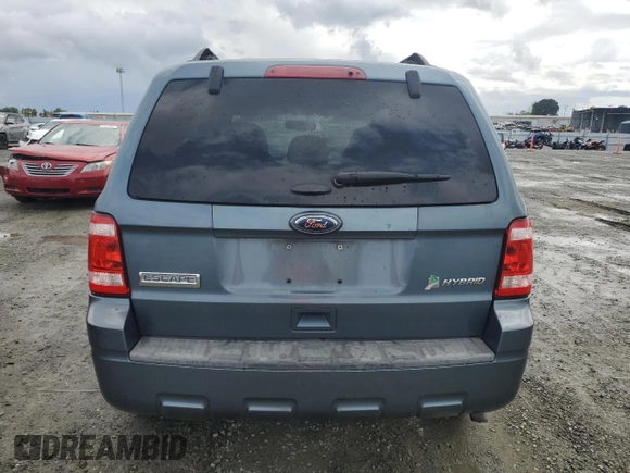 2011 Ford Escape Hybrid z VIN 1FMCU4K34BKC63661, wystawiony jako Copart lot #50991195 z przebiegiem 109 791 mil mil oraz Szkoda całkowita • Salvage title. Historia ofert i sprzedaży dostępna na DreamBid. Obrazek 6.