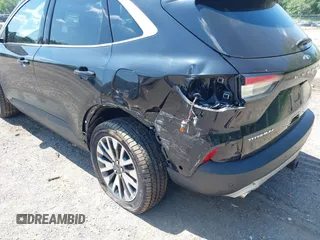 2020 Ford Escape Titanium with VIN 1FMCU9J92LUA27373, listed as a IAAI auction lot 42650077 with 42,179 mi miles and . Bid and sale history available at DreamBid. Image 18.
